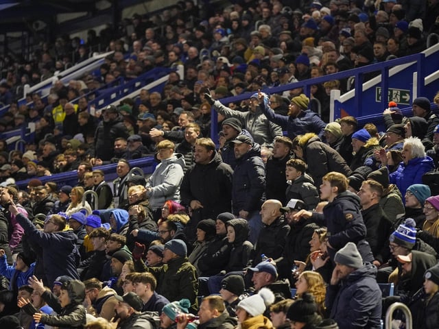 Pompey fans backed their team to a crucial Championship survival win over Cardiff last night.