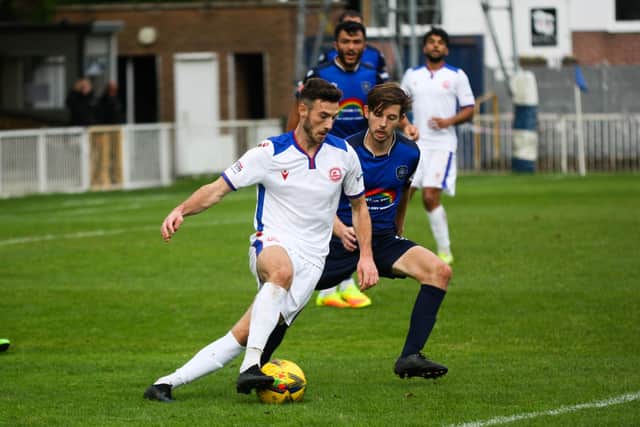 Bradley Tarbuck in possession during Gosport's 3-1 loss at Met Police. Picture: Tom Phillips.