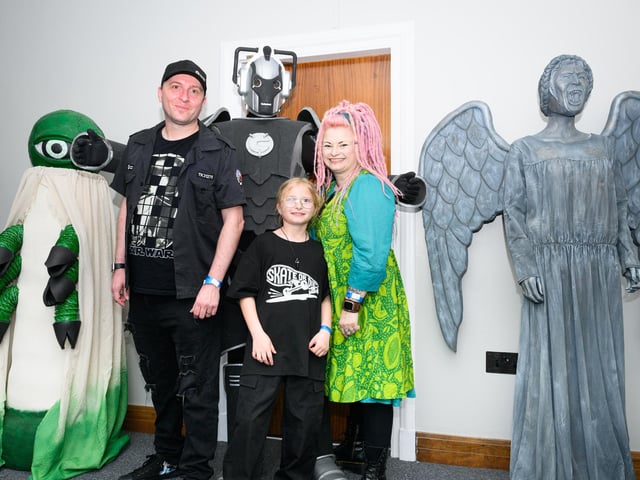 Sean, Jasmine and Kelly Binfield with some of the many Doctor Who characters. Picture: Keith Woodland (110521-44)