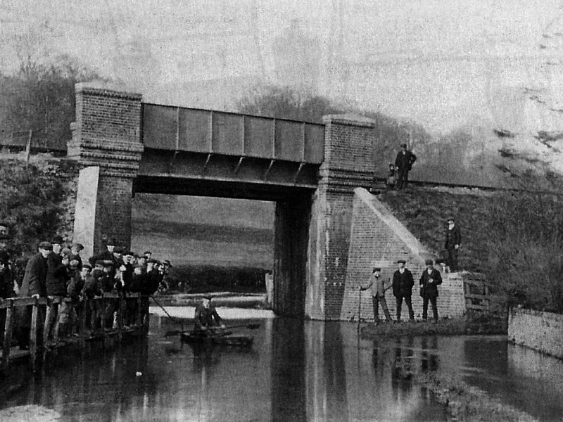 Water under the railway bridge at Dean Lane End, Rowland's Castle circa 1900.The water was so deep a canoe could be paddled. Picture: Ralph Cousins postcard collection.