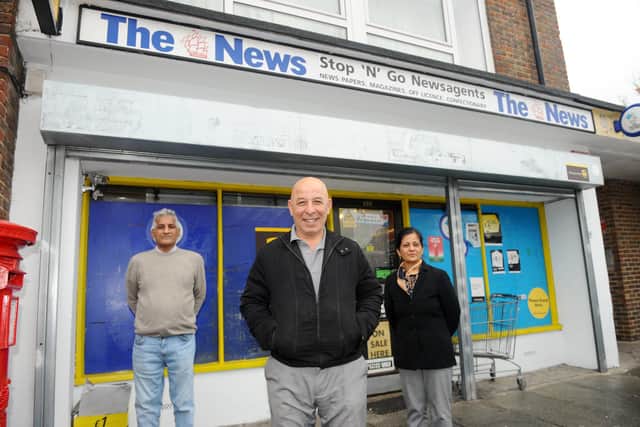 Rakesh and Parveen Basra are standing down as the owners at Stop 'N' Go newsagents in Arundel Street, Portsmouth.Pictured is: (back) Rakesh and Parveen Basra with new owner Mohamed Mohsen.Picture: Sarah Standing (291020-7077)