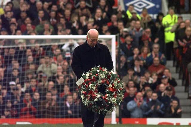 Sir Bobby Charlton laying a wreath to mark the 40th Anniversary of the Munich Air Crash before Manchester United's Premiership clash against Bolton in 1998. Picture: John Giles/PA Wire.