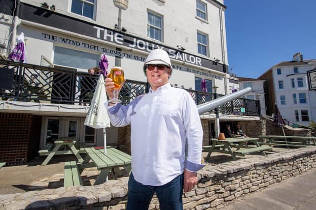 Landlord of The Jolly Sailor, Southsea, Ross McInally, raises a glass. Picture: Habibur Rahman