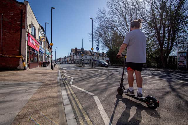 A person on a unmarked e-scooter in Albert Road, Southsea, Portsmouth. Picture: Habibur Rahman
