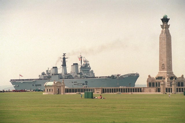 HMS Invincible passes the Naval War Memorial on the seafront at Southsea after returning from the Gulf and Adriatic in 1999. Picture: David Garvey