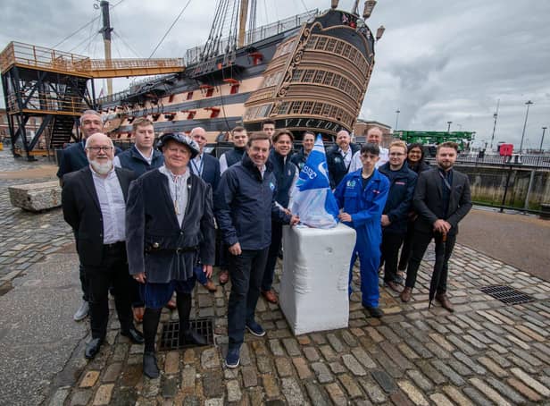Unveiling of Sea Angling Classic Trophy at HMS Victory at the Historic Dockyard, Portsmouth on 20th May 2022Pictured: BAE System members and Sea Angling team with apprentices of BAE systems and Hythe Marina with the Trophy ready to be unveiled outside HMS Victory, PortsmouthPicture: Habibur Rahman