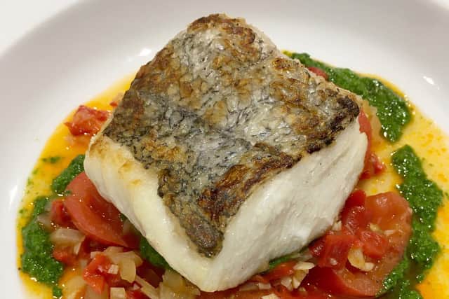 Hake with tomato and basil by Lawrence Murphy.