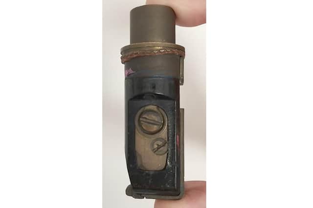 The very same brass plug Tim King used to wrap his copy around and throw to the waiting press boat.