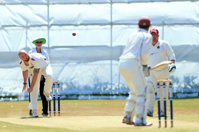 Jono Willey bowling for Portsmouth & Southsea against Havant 2nds.
Picture: Chris Moorhouse