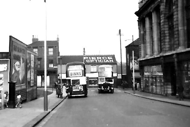 A late 1950s image showing buses passing outside the Central Stores. Photo: Hartlepool Library Service.