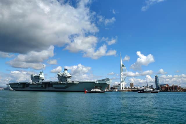 HMS Prince of Wales pictured previously departing Portsmouth Naval Base. Photo: Paul Currie