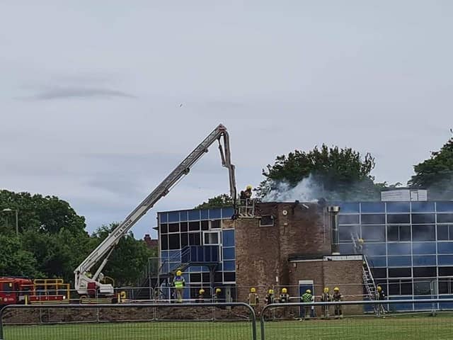 Firefighters pictured at Brune Park Community School fighting a blaze at one of the site's buildings. Photo: Simmone Prager