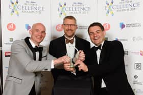Craig Gordon and Michael Frisby of Vuzion UK with editor of The News Mark Waldron at the Business Excellence Awards 2021