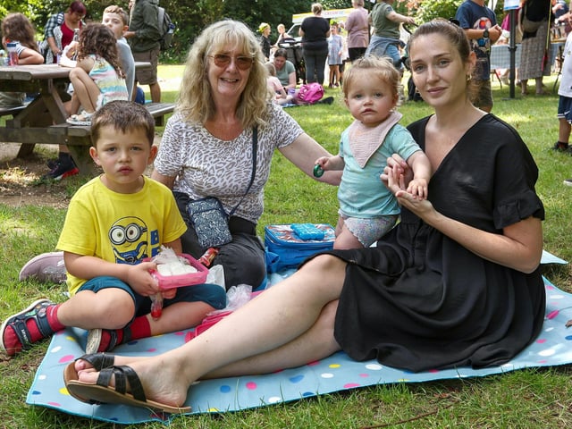 Cat Heggarty (right), with her mother, Debbie White, and children, Tommy, 4, and Brooke, 1, enjoying a great day out at Holly Hill Woodland Park.Picture: Chris Moorhouse (140824-03)