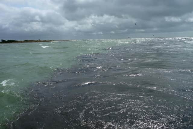Sewage being discharged into the sea off Eastney, following a storm