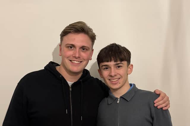 Running mate: Finley with Jake Woods, who is running an ultra marathon for the Stroke Association
