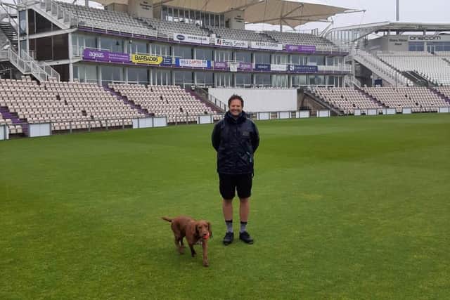 New Hampshire groundsman Simon Lee with his dog at The Ageas Bowl
