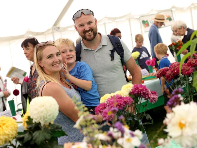 The Emsworth Show taking place on August Bank Holiday Monday in the sunshine. Pictured is (L-R) Lyz Parris holding Logan, 5, and Marc Albrecht.Monday 28th August 2023.Picture: Sam Stephenson.