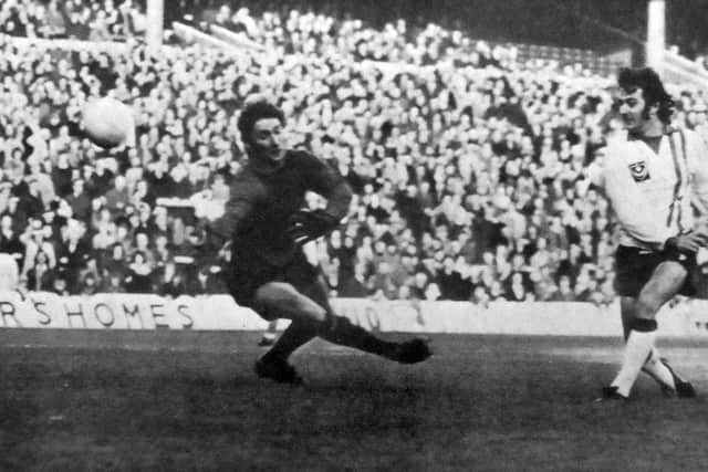 Norman Piper takes a shot at goal against Hull at Fratton Park in Division Two
