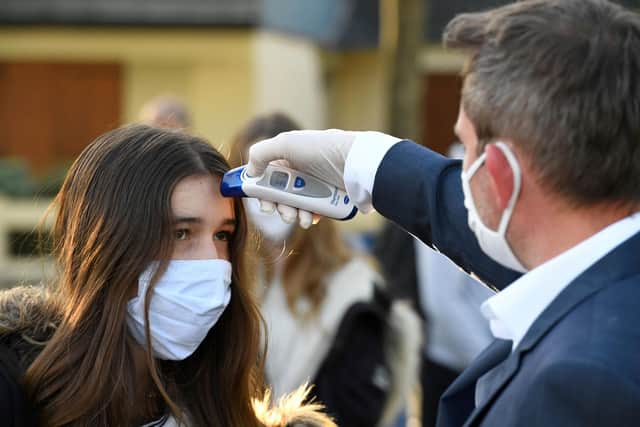 The University of Portsmouth is to carryout temperatures checks on people entering university buildings.
Photo by DAMIEN MEYER/AFP via Getty Images.