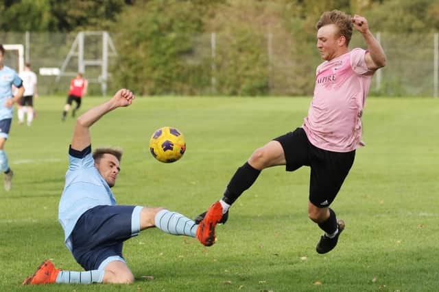 Harvest (pink) in action during their 9-1 Mid-Solent League hammering of Portchester Rovers. Picture: Kevin Shipp
