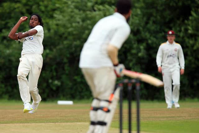 Tyrel Chicot on his way to taking five wickets for Gosport Borough at Purbrook.
Picture: Chris Moorhouse