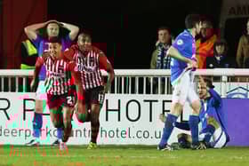 Ollie Watkins celebrates his 90th minute equaliser for Exeter against Pompey in March  2016, his first ever league goal. Picture: Joe Pepler