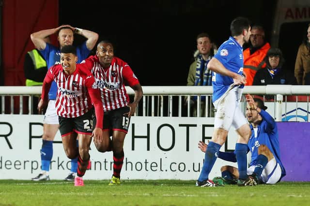 Ollie Watkins celebrates his 90th minute equaliser for Exeter against Pompey in March 2016, his first ever league goal. Picture: Joe Pepler