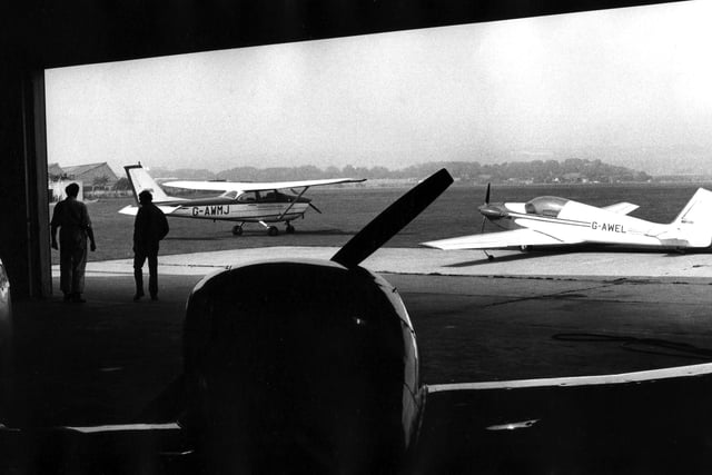 View of planes from the hangar at Portsmouth Airport.