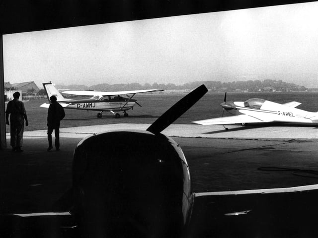 View of planes from the hangar at Portsmouth Airport.