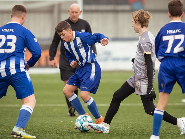 Action from the U15 Campbell McFaull Invitation Cup final between Hayling St Andrews Blue and Hayling St Andrew White. Picture: Keith Woodland (260221-336)