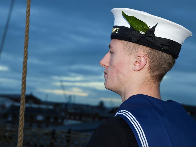 Pictured: Morning colours are conducted before the HMS Victory ceremony.