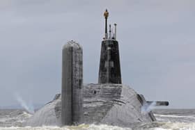 Pictured is HMS Vanguard as it 'vents off' as she leaves HMNB Clyde (Faslane).