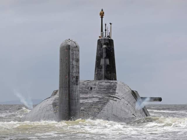 Pictured is HMS Vanguard as it 'vents off' as she leaves HMNB Clyde (Faslane).