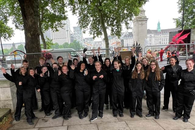 Gosport students perform in front of The Queen at the Platinum Jubilee Pageant by carrying wolfhound and snake. Picture: Tom Barnes.