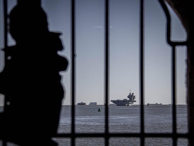 HMS Prince of Wales seen through The Round Tower, Old Portsmouth. Picture: Habibur Rahman