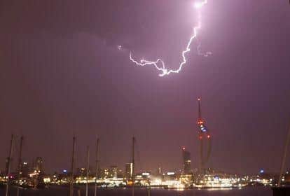 Lightning illuminating the city skyline, as seen from Gosport. Picture: Andrew Thomas