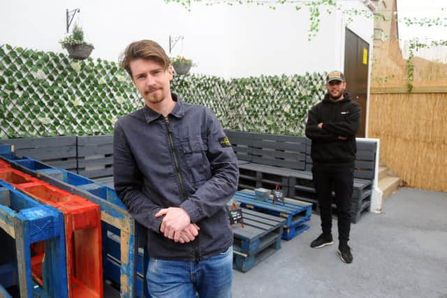 Moonshine in Grenada Road, Southsea, have opened up an outdoor area.

Pictured is: (l-r) Yannick Rowe, one of the owners of Moonshine and Danny Peart, booking agent and events planner.

Picture: Sarah Standing (280422-2878)