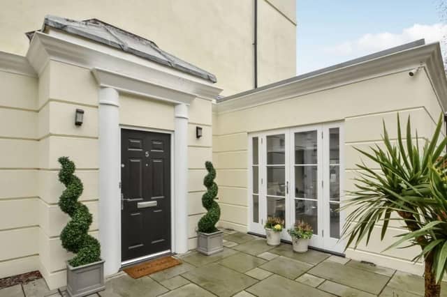 This property comes with four bedrooms, two bathrooms and two reception rooms.