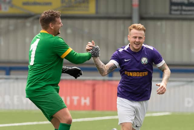 Jon Kercher is congratulated by Jamie Cowdery after his goal. Picture: Keith Woodland