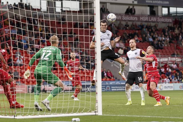 Pontus Dahlberg of Doncaster Rovers saves from John Marquis (Photo by Daniel Chesterton/phcimages.com)