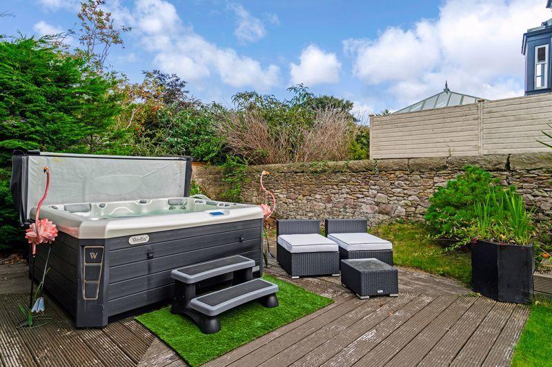 Rear garden - the hot tub may be available by separate negotiation.