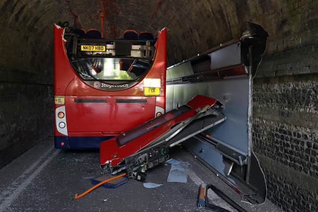 The scene on Wellhouse Lane in Winchester after three children were taken to hospital with serious injuries while 12 others suffered minor injuries after the school bus they were travelling in crashed into a railway bridge. PA Photo. Picture: Andrew Matthews/PA Wire