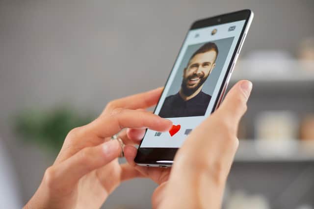 Woman using dating app.