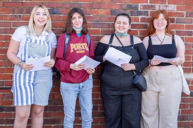 Students at Portsmouth College with their results in August this year. Picture: Habibur Rahman