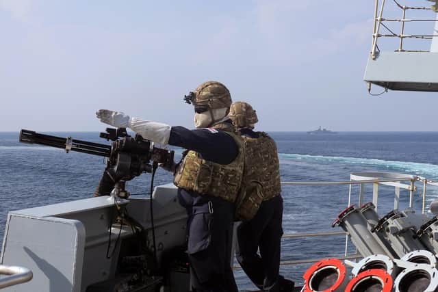 Pictured is an air defence exercise onboard HMS Montrose during Exercise Khunjar Hadd 26 in the Gulf of Oman.
The ship's minigun operators are engaging in defensive duties with 'hostile' aircraft during the exercise.
