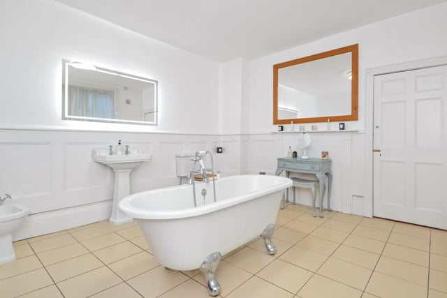 This stunning property also has a free standing bath.