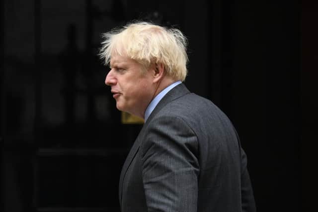Prime Minister, Boris Johnson returns to number 10 Downing Street after the weekly cabinet meeting held at the Foreign and Commonwealth Office on September 30, 2020 in London, England. (Photo by Leon Neal/Getty Images)