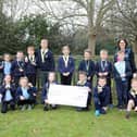 Lee-on-the-Solent Junior School and participants from Years 3, 4 and 6 with their prize.