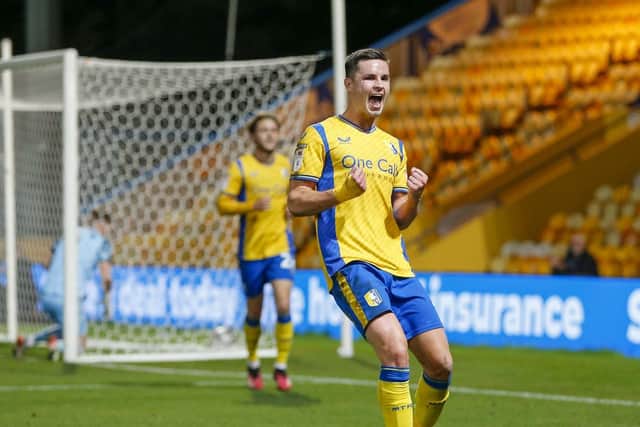 Callum Johnson celebrates scoring against Doncaster in the EFL Trophy earlier this month. Photo credit - Chris & Jeanette Holloway / The Bigger Picture.media